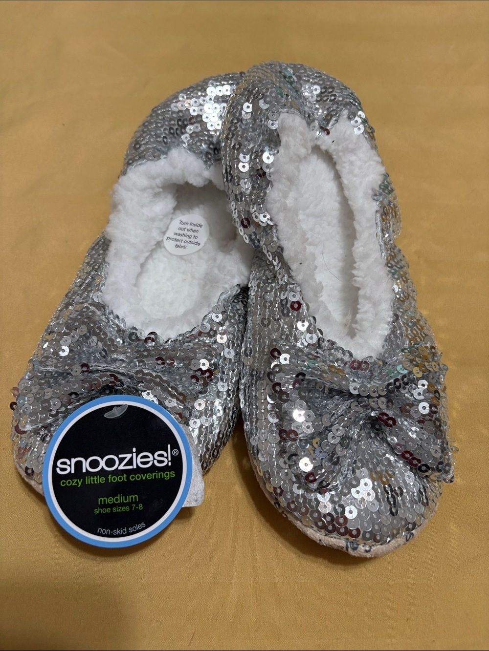 Snoozies! Women's Silver Sequin Cozy Slippers - Medium